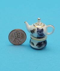 Porcelain Teapot on Burner Cat